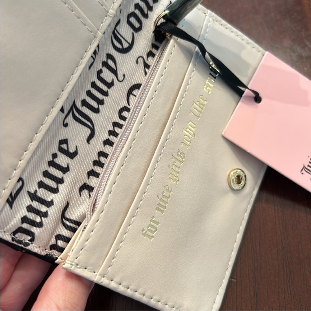 Juicy Couture Flawless Slim Elongated
Licorice Bifold - Picture 10 of 10